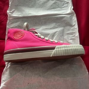 PF Flyers size 9 men and 10 1/2 women’s. Color is raspberry.